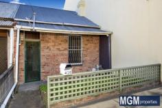 428 Botany Road Beaconsfield NSW 2015 Presenting an affordable opportunity to move into a thriving city fringe address, this delightful cottage offers exciting expansion options for an astute buyer to capitalise or run your own business from home. Currently a generous one bedroom with scope to increase to two, Set on a 141sqm block, is close to trendy cafes, shops, transport and Green Square station. * Generous sized bedroom plus attic * Large Kitchen + Dinning area * Good size bathroom and laundry * Zoned 9a ( mixed uses ) * Large lock up garage and work shop *Excellent opportunity to redevelop and add value (STCA) * Short walk to trendy cafes, shops and Green Square station