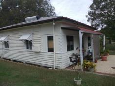 26 North St North Ipswich QLD 4305 This Property is on 2 Titles This homely 2 bedroom property is settled in the peaceful rear streets of handy North Ipswich. Take a moment to relax and lap up the afternoon sunshine on the front porch. Upon entrance of the property you will notice the polished timber floor boards and clever paint design throughout. The ever welcoming lounge room entices you with its cosy electric fireplace. The kitchen is equipped with plenty of cupboard space and a modern twist to the old home. Bathroom is perfect for families featuring a large bath to unwind in and is complete with a good sized shower. Property is complete with an internal laundry, large backyard for the family to enjoy and is fully fenced. Property is virtually maintenance free and was recently renovated in 2011. Just minutes' drive to the bustling Ipswich CBD, Ipswich City train station and easy highway access. Walking distance to Riverlink Shopping Centre, schools and parks this property will be sure to surprise you.