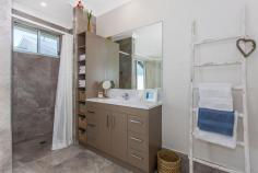 356 Casuarina Way Kingscliff NSW 2487 This freshly presented, beach house is located within a short 400m walk to the beach and a few steps from the magnificent Cudgen creek providing lifestyle and lots of fun! Architecturally designed and built in 2012 by Sanctuary 28, it has 4 spacious bedrooms, 3 bathrooms and a 2 car garage. The downstairs bedroom is self contained, with its own TV, kitchenette and en-suite, which can be used for extended stays for family/ friends. From upstairs there are views of Mount Warning (Woolumbin) to the West and glimpses of the Pacific Ocean to the East. There are quality appliances and fixtures throughout, including large ceramic floor tiles, Caesar Stone bench-tops,custom cabinetry, air conditioning and a 5000L water tank. This home would suit a family, "empty nesters 'wanting a downstairs master bedroom (there is one upstairs too!), and/or an investor looking to holiday rent and enjoy in between.