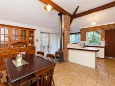 19a Bilgoman Road, Glen Forrest, WA, 6071 A True Gem on a gorgeous 1800sqm block. If you are looking for an extremely neat, well presented home on a pretty block then look no further. This gem is for you! Situated towards the rear of the block this four bed, two bath brick and iron home has been lovingly cared for and maintained over the years by the current owner that it has held its age well. Built in the early nineties and boasting neutral decor, this is a very comfortable and spacious home. The main bedroom, situated at the front of the home is a generous size with walk in robe and ensuite. The three minor bedrooms, situated at the opposite end of the home are also a good size all with built in robes. The separate formal lounge offers a great space to sit and enjoy the view out over the front of the block. The spacious open plan kitchen and dining with its high raked ceilings look out to the large patio perfect for outdoor entertaining where you can also enjoy the privacy of being well screened from your neighbours. Nestled behind the house sits a large powered shed/workshop complete with concrete floor and double roller doors. There is also a wood shed plus a garden shed for extra storage.