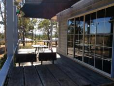 10 Braeside Ct Boonah QLD 4310 Inspections Inspections by appointment only. This
2 bedroom home is located in a exclusive estate in Boonah. On an acre
and a half it feels like you are living in the country with the
convenience of being in town. The home has been designed with 'living'
in mind. The bedrooms are extra large with the main bedroom having a two
way fireplace. Huge living area with glass sliding doors cleverly
placed so wherever you sit you have views to the countryside. Wrap
around verandah and huge carport. Nothing to do here move in and enjoy
the view. Priced well with other homes in the estate being double the
price to buy. Get in quick, first to view will buy it.