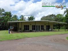 Bees Creek NT 0822 High and dry 5 acre block, incorporates a large 4 bedroom home, airconditioned and tiled throughout, ensuite and walk in robe, built in robes, gas cooking, dishwasher and pantry, wraparound lined verandahs, inground saltwater pool, 12x6m shed/carport with an enclosed bay, bitumen driveway, caravan shelter and ablution block, horse paddock, fully fenced, town water.