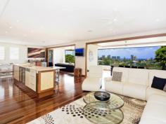 5/61 Garrick Street Coolangatta Qld 4225 This sublime four-bedroom apartment is 1 of only 6 in Coolangatta’s most exclusive residence, and features a high-specification contemporary interior, expansive indoor and outdoor entertaining space and breathtaking panoramic views. Boasting exceptional luxury in every room, this outstanding and stunning home has the ambience of a magnificent retreat perched high on its own hilltop oasis, yet is ideally placed only moments from the restaurants and cafes lining the best beaches on the Gold Coast. From your car park, the lift glides up to your own floor where a grand entrance will meet you as you step inside your own superior showpiece: • Largest whole-floor apartment within this boutique building • Walk to beach • Ocean panorama from Rainbow Bay to Cook Island • Quiet, residential location • Timber bi-folds span whole width of terrace for seamless flow of indoor/outdoor living • Expansive timber flooring, lush carpeting and plantation shutters • Sleek, stylish, sophisticated kitchen with Miele appliances • Teppanyaki bar off kitchen counter • 5 wall-mounted LCD TVs • In-built $35,000 stereo system pipes music around the home • Secluded main bedroom with amazing ensuite and sumptuous spa bath • Floor-to-ceiling tiles in both spectacular main bathrooms • The ultimate guest suite • Audio-visual intercom security • Daikin ducted air conditioning • Three bathrooms including powder room • Very low body corp • Residents’ saltwater pool with thatched Balinese pavilion with BBQ & fridge • Two secure car parking bays • Located on leafy, peaceful street • Master Builders Queensland 2008 Winner Best Residential Building up to $12 Million …and there’s a whole world more of gorgeous features waiting to be discovered…