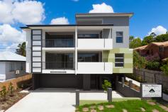 5/31 Palmer Street, Greenslopes Top floor apartment 3.3m high ceilings with fantastic district views. With a contemporary design in a fantastic location, this apartment checks all the boxes when you are seeking a near new luxury apartment which offers great space and flexible living. Upon entering this spacious 2 bedroom apartment you will be pleasantly surprised by the open plan, quality finisher's and abundance of natural light with 3.3m ceilings Cleverly designed gourmet kitchen, featuring Miele stainless steel appliances, stone bench tops, all ideally suited for entertaining. Greenslopes is a well positioned suburb just 6 .3km South of the Brisbane CBD and provides residents with outstanding amenities and a fantastic suburban lifestyle. This apartment has incredibly central location in a quiet cul-de-sac in a leafy setting. With easy access to the M1, excellent schooling options, Griffith University Campuses at Nathan and Mt Gravatt, Greenslopes Private Hospital, Greenslopes Mall, Westfield Garden City and Westfield Carindale - everything really is on your doorstep! Siting pride of place on the top floor of this boutique complex of eight apartments, it features many fantastic inclusions: - Apartment is on the top floor, with 3.3m high ceiling and receives abundant natural light - Fully tiled living and dining - Large North east facing covered balcony with a sensational uninterrupted district views - Modern kitchen complete with Miele Stainless steel appliances, stone bench tops, two-pac cabinetry with soft close doors and draws - 2 good sized separated bedrooms with built-in wardrobes and easy bathroom access - Master bedroom has an ensuite , walk in robe and direct balcony access - Air-conditioned living areas - video intercom - Storage cage in secure garage Stylish, spacious and convenient - this apartment ticks all the boxes. Don't miss your chance to own one of the best apartments in Greenslopes. This unique apartment will not last long at this price! Call NOW to arrange your inspection