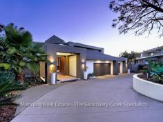 5718 Observation Crescent Sanctuary Cove QLD 4212 The "Pavilions"
is an architecturally designed home in excess of 90 squares with gate
house entry. Approx 1500m2; the block extends to 2 street frontages
with private access from both. In an elevated position the property
enjoys panoramic views across the golf course to the hinterland and
beyond. A unique residence in a very central position; it offers the
owner the opportunity to entertain on a very large scale in total
privacy. Upper Level: A stunning master suite with dual walk in robes and ensuite with spa. Full length balcony with a superb outlook over the golf course 3 more bedrooms with ensuites – 2 with walk in robes – 1 with built in robes Entry Level: Smeg kitchen with Caesar stone bench tops & walk in pantry Choice of several entertaining areas Formal lounge with gas fireplace Sauna – Rumpus – Full bathroom Media room & Study Family room with wet bar Alfresco entertaining with barbecue facilites and alfresco dining. Outdoors: Large terrace with serene views over the golf course Extremely private in-ground pool Screened florida room Garaging at both street levels. Easy care gardens . General Features Property Type: House Bedrooms: 4 Bathrooms: 5 Indoor Features Intercom Study Broadband Internet Available Built-in Wardrobes Dishwasher Air Conditioning Open Fireplace Outdoor Features Remote Garage Secure Parking Garage Spaces: 4 Balcony Courtyard Outdoor Entertaining Area Swimming Pool - Inground