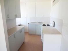 27 Wallace St Bell QLD 4408 Property Description:Lot 2 on RP 105670, Parish Maida Hill. Land Area 1062 m2. Hard to find a purpose built duplex like this. Each
unit features 2 bedrooms, a semi modern kitchen, bathroom with shower
over bath, downstairs laundry, front and rear verandahs, and electric
hot water systems. All windows and doors have security screens
fitted. The building has a chamferboard exterior, masonite interior,
concrete stumps and iron roof. Each unit has a septic system, town water is connected with individual metering. Each unit has separate carport and concrete access paths. The property would suit an investor or a family where independant living is required.