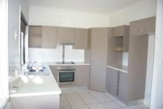 1/9 Mill St Landsborough QLD 4550 YOU WILL NOT FIND A BETTER POSITION THAN THIS. Only 50 metres to the
supermarket, cafes & hotel,100 metres to the railway station. This
modern 3 b'room unit
has a big kitchen with dishwasher, pantry and good bench space, tiled
airconditioned living area, all the bedrooms have ceiling fans and
built-ins, the master has an ensuite and there is a bath and shower in
the guest bedroom. This spacious unit has three toilets one being in the
powder room on ground level. The living area opens out onto the private
fenced courtyard and there is a water tank as well as town water. An
added bonus is a large remote control DOUBLE garage. This unit is in
small complex of only 5 with low body corporate fees..