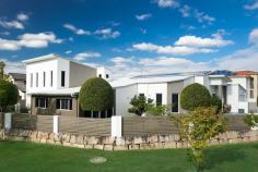 14 Waterbrooke Cct Drewvale QLD 4116 Fourteen on Waterbrooke This prestige executive residence on offer today delivers all that your family requires and more! Welcome to Fourteen on Waterbrooke in Drewvale. Step inside and experience the quality and exceptional architectural design of this residence, all 574 square metres (approx. 61 squares) tailor made for a modern lifestyle. There’s two of everything in this split level, double storey home that sits on a high positioned 824 sqm block of land that overlooks the park. Formal Living A convenience to have when needed, this area is just the right size to have more formal meetings in. Family Dining This area can cater to the largest of families, from birthdays to holiday feasts. There’s room for the whole family and your extra large dining table will not only fit but also look at home in this spacious room. Kitchen Both kitchens in the home come complete with Miele European appliances, gas cooktops, ovens (both gas and electrical), steam oven and a dishwasher in the main kitchen. Granite bench tops and durable 2 pac cabinetry give both kitchens a stylish appearance. A superb butler’s pantry in the main kitchen will ensure you have all the space for your culinary goods. It’s a joy to create new dishes or preparing those delicious family favourites in these well-planned kitchens! Study Decorate it to your taste and you will find an excellent functional room for the children’s homework or your home office. Bedrooms There are six in total, including two master suites and four generously portioned rooms for the children and guests. Each of the bedrooms has their own built in robes so that storage space isn’t a worry. Library or Music Room The musically talented in the family will love their time playing musical instruments or listening to their favourite music away from the other common areas of the home. Mum and Dad can enjoy a gentle relaxing read, cozying up with a good book and a hot drink here. Media Room The home has a massive media room where the whole family and friends can get together to enjoy a movie or the latest game. Family Room The family room is filled with plenty of natural light and is the ideal place where the family can get together, catch up and share the day’s happenings. Overlooking the park, this room is fitted with block-out screens for easy automatic shade and extra privacy when needed. Master Suites There are two master suites, both of which are gloriously appointed with high ceilings and are luxuriously spacious. Each of the master suites have their own en-suites that are fully tiled, fitted with spa baths, shower amenities and double vanities. Ladies, the generously sized walk in robes give you the chance to showcase all those clothes, handbags and glorious shoes! This property is situated in a sought after area of Drewvale and is close to all schools, ranging from childcare, kindergarten, primary schools and the highly regarded Stretton College being just a short walk away. A lovely small park is a wonderful addition to the surrounds and gives a beautiful green vista looking out from the family room. Nearby buses to the city approximately 2 mins walk, shopping centres and restaurants. Features • 6 Bedrooms in total • 2 Master Bedrooms with Walk In Robes and En-suites • 4 Bathrooms • 2 Kitchens • Formal Lounge and Dining • Library or Music Room • Separate Study • Huge Media Room • Steel Frame Construction • 5 KW with 28 Solar Panels • Council Rates: $400/quarter • 5000L Water Tank • Ducted Air conditioning with 6 Zones • Fully Landscaped Garden • Rendered External Walls • Intercom and Camera • 2 Car Garage