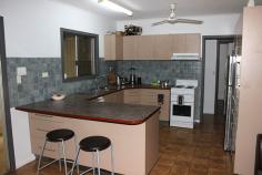 19 Karama Crescent, KARAMA NT 0812 THE HOUSE Built in 1983, offering 3 bedrooms with air-conditioning and robes, newish kitchen, new certified bathroom, freshly painted inside, open plan living with tiled floors and offering easy care living. NO ASBESTOS! OUTSIDE Fully fenced 807m2 level block, large covered entertaining area, lush lawns, cooling shady tropical gardens with room for a pool, outside laundry, garden shed and shade sail over the parking area. CHEAP POWER with solar panels on the roof powering the electrical grid. LOCATION is a walk to everything saving on fuel too. - See more at: http://www.rvpnt.com/property/19-karama-crescent/#sthash.N9yY2v2p.dpuf