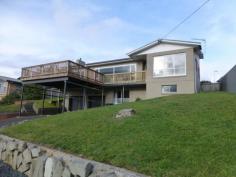 1601 Murchison Highway Yolla TAS 7325 Be part of the friendly Yolla community and purchase this solid refurbished home within walking distance of the local school, shop, post office and Tavern. Tastefully decorated throughout the home has three bedrooms (all with built-ins) with a great in built wood heater heating the large lounge which overlooks the deck and surrounding rural vista. A Pureheat is used as a back up in the dining/ kitchen area. Good bathroom and separate spa room. As you make your way downstairs you come to a two car garage with pit and gym as well as room for a rumpus and other options with lots of space to chose from. At the rear of the home there is another entrance with access to extra parking and a 70 sq m double garage with its own open fire. A colour bond roof including skylight is only three years old. Commute easily to Wynyard or Burnie in 20 minutes. Make an appointment to view today.