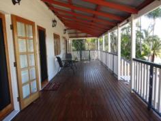 72 POOLE STREET BOWEN QLD 4805 PRIDE AND PASSION DESCRIBES THIS RENOVATION Classic comfortable Queenslander with the traditional features we all love - large block, wide, spacious verandahs, high ceilings, timber French doors and that 'homely' feel when you walk in. Outdoor entertaining is well catered for with the huge front verandah combined with the private covered back deck where you can truly enjoy the experience of being among the trees and tropical atmosphere. What a perfect spot to enjoy some 'quiet' time over a coffee, good book or just to catch up with friends and a barbie. Not to mention lazy days slipping into the pool for a dip. Well presented with bright, open living spaces and carpeted floors, this property features 4 bedrooms (2 opening to the front verandah) and plenty of room for dining and relaxing. The light galley style kitchen opens through glass doors to the outdoor deck with classic bullnose roof and overlooking the pool. Low maintenance gardens add to the charm with native bauhinia, gum and bottle brush trees to attract all the bird life. With great street appeal, this Queenslander has all the significant attributes and charm you expect - nothing left to do but enjoy. Come and inspect this one - it's worth a look.