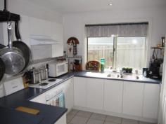 2 Golf Links Rd Lobethal SA 5241 Very neat & Tidy brick home only 13 years old features 3 good size bedrooms Master with large ensuite & Walk in Robe, well positioned kitchen with electric under bench oven & electric hotplates double sink and plenty of cupboards including a large pantry.Adjacent is a large family / meals area with tiled floors, downlights and access to outdoor entertaining area.There is a second living area or formal lounge . There is reverse cycle air cond wall split that efficiently heats & cools the home all year round.The home Has fully insulated exterior walls & ceilings and has Steel Frame. The quiet lane only services 5 homes and across the road is a large reserve , a stones throw to the oval & rec grounds Ideal for the kids. This one owner home has neat and tidy gardens colourful roses & privacy hedges there is also a double carport & Large garden shed . Great Home Great Location, Affordable Price.