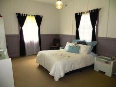 WOODENBONG, NSW 2476 This beautiful cottage is located in the township of Woodenbong, under 1.5hrs to Brisbane, Gold Coast and Byron Bay. Positioned in a high spot in town, it has magnificent views to the surrounding Border Ranges. Features Include: - Three bedrooms, two with built-ins - Timber floorboards - French doors opening onto the front and rear deck areas - High ceilings with original horizontal timber wall boards - Intricate timber fret-work throughout - Large bathroom with shower and bathtub - Open plan kitchen and dining area - Combustion wood fire to keep you warm in winter - Single lock up garage - Quarter acre allotment