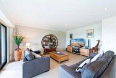 Caves Beach, NSW 2281 One of only a couple of
beachfront reserve apartment options available in Caves Beach, this
property distinguishes itself from the others in a big way. Offering
features far superior to its neighbours, in terms of bigger apartment
size, bigger garaging options and genuine ocean views with direct beach
access not available in the bigger apartment options set back from the
beach. Set in a more intimate group of only 5 apartments, this
property boasts the only internally accessed 2 car remote entry garage.
The current owners have their boat, car and plenty of shelving and
stored items comfortably arranged inside. The apartment itself
features generous, softly down-lit open plan living that flows off the
entry and out to an extremely large, covered outdoor living area. The
minute you walk inside you are taken aback by the unexpected
spaciousness of the living and also the delightful outlook to beachfront
shrubbery and ocean views. Spot the whales or count the ships and enjoy spectacular sunrises and amazing Nor Easterly breezes all summer long. The
living flows off the top end, quality, 2 pack and granite designer
kitchen, which is complete with not only an outlook to the living areas,
both inside and out but also the ocean view. The internal living
offers large dining and large lounge options with 2 sets of big stacker
doors connecting the living to the oversized, outdoor living and the
ocean view. A genuine, separate laundry also opens out to the deck and is complete with a very handy second toilet. The
deck boasts room for both outdoor lounge and dining options with a tap,
power and lighting all provided for extended easy all seasons
indoor/outdoor living. Back inside discover 2 king size bedrooms both
complete with generous built in wardrobes and easy access to the
oversized bathroom with a feature large heat pump spa and separate
shower. Every surface is like new with tradesmen quality paintwork
throughout, gorgeous new carpets right through and quality shicane
blinds throughout the living. A wonderful place to retire to with no
work left to be done, feel like you are on holidays, 24/7, 365 days of
the year from here! Two other owners in the complex have made it their
beach house weekender and home away from home, where they can escape
Sydney and enjoy the peace and quiet and the sand and the surf or just
day dream their days away while drinking in the views!