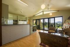 20 Highview Close Farleigh QLD 4741 A rare opportunity to own a piece of paradise... This unique architecturally designed home is elevated with panoramic views of Farleigh and surrounding countryside. This
beautiful family home is just a leisurely 4 kms drive to Mount Pleasant
and has been designed to capture the cool breezes throughout, plus
magnificent views, all on a substantial 2.6 acre terraced block -
surrounded by quality neighbouring homes. Privacy and comfort are
assured with much thought and planning featured in the design of the
layout. The kitchen and family room are centrally located, cathedral
ceilings, giving the feeling of space and an abundance of natural light.
This living area flows onto a very generous entertainment area, which
is positioned to capitalise on those magic views. Living and formal
areas have been cleverly separated from the double sized bedrooms to
ensure comfort and privacy. With many features including: * 3 x double size bedrooms + Office * Enormous walk-in-robe and ensuite * Large main bathroom * 2 pac Kitchen with stainless steel appliances * Air-conditioned lounge/dining room * Separate Family room * Floating ... General Features Property Type: Acreage/Semi-Rural Bedrooms: 3 Bathrooms: 2 Building Size: 240.00 m² (26 squares) approx Land Size: 1.05ha (2.60 acres) (approx) Outdoor Features Garage Spaces: 2