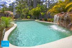 13 Vesta Close Springfield Lakes QLD 4300. This is an absolutely stunning Sherlock custom built home that you will
fall in love with as soon as you come for a viewing. This is truly your
dream home that you have been waiting for and presents like brand new!
Your
family will just LOVE this 35m2 Masterpiece featuring 4 bedrooms + 2
living areas... with a beautiful inground swimming pool to enjoy all
summer long!!!! All situated on a large 863m2 block with Vesta close
being a fantastic location as the house is situated in a serene and
private cul-de-sac street against the bushland reserve.
Stunning
front entrance appeal you will enter into a wide and welcoming hallway
leading to a great sized lounge area with it's own private decked sala.
On the other side of the private hallway you will find 3 great sized
bedrooms with extra wide robes, all with ceiling fans and vertical or
timber style blinds.
As you walk towards the back of the home you
will pass the timber french doors which creates separation from front
to back for privacy and leads you to the open plan kitchen, dining,
lounge area with high raked ceilings and quality finishes such as stone
bench tops in the well appointed kitchen including blanco stainless
steel appliances.
The master bedroom at the back is absolutely
gorgeous and huge with separate his and her walk in robes and double
sink ensuite with double shower.
Both the master bedroom and open
plan living areas lead onto your fantastic undercover patio
entertaining area overlooking your perfect poolside paradise. This will
surely become your favourite place for relaxing or enjoying those party
occasions.
Extra features:
3 Kw solar electricity Panels
Gas cooktop
Rainwater tank
Security Alarm system
Double side gate access perfect for the trailer, small caravan, boat
Inground concrete swimming pool with beautiful water feature
Stone bench tops in gourmet kitchen and all bathrooms
Fisher and Paykel dishwasher
Blanco stainless steel appliances
Panasonic Inverter split system
Security Screen windows and doors
This
beautiful home is only minutes drive or walk to the new train station,
close to the university, schools, lakes and parks. Exciting new
developments include stage 2 of Orion Shopping centre, Event Cinema
complex and hospital. Call now for your personal Viewing !
