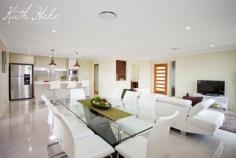 22 Hoffman Drive Marian Qld 4753 This stunning high quality, family home is sure impress. As soon as you enter the home you will notice the high quality fit out, from the water feature at the front entrance, and sandstone tiles on the front porch. The home is fully air-conditioned and security screened and features 4 large built-in bedrooms + study/5th bedroom. The large main bedroom, features a good sized walk-in robe with plenty of hanging and shelving space + beautiful en-suite featuring a double vanity with trendy basins and stone bench top + fully tiled glass free shower with wall recess. Large open plan family and dining with beautiful porcelain tiles and built-in "bamboo" wall feature" + modern island style kitchen featuring, stone bench-tops, stainless steel "Bosch" appliances including dishwasher, trendy pendant lights and walk-in pantry which has built-in cabinetry. Separate carpeted lounge/theatre room. Beautiful main bathroom also with glass free, fully tiled shower with wall recess + modern vanity and bathtub. Good sized laundry and double remote control garage off the house, directly off the kitchen for easy access with the groceries. Living area leads out to the large patio also with beautiful sandstone tiles, perfect for outdoor entertaining + concrete path all the way around the house. Huge 1,00m2 fully fenced allotment with side access to the back yard. Heaps of room for the pool and shed.