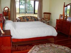 49 Anne Collins Crescent Mundoolun QLD 4285 True Country Living On 7 Acres Final Reduction - Now Only $725,000 A great big sprawling Queensland Colonial with views to Tamborine that really has it all – and is only 3 years old. The
7 acres that the home sits on is divided into 5 paddocks (3 large &
2 small), and has 3 Sheds, a dam, an animal shelter/shed, chook house,
and quality fencing (some even dog proof). The home has 4 country sized bedrooms, 2 bathrooms and has verandah’s front and back to take in the truly outstanding views. On
entering the home you are met with a massive dual living area with 12’
vaulted ceilings, polished floors, ironbark feature posts, a pot bellied
stove especially designed for providing central heating. The vaulted
ceilings extend through to the great entertainment area on the back
veranda. This home has so much space it will take BIG Furniture. Adjoining
the living area is a massive country kitchen with quality all the way.
Beautiful rare granite bench tops with timber doors, a Fisher &
Paykel induction stovetop,& oven as well as a Kleenmaid dishwasher. You’ll
appreciate the 9’ceilings throughout the rest of the home especially in
the four bedrooms as it makes for a very cool & spacious living as
one should expect. This home although modern and almost new has a
wonderful old-fashioned country ‘feel’ about it. This family
residence also hosts a fully functional granny flat (or guest wing) with
its own living area, kitchen, bedroom and (3rd) bathroom. The home also boasts ‘Crimsafe’ security screens on all the windows and doors. There
is a massive storage area under the home big enough for trailers, boat,
ride-on mower, and equipment. Much of this space is concreted. This is genuine a working rural property at its finest...Live the Dream! CLICK ON ANY PICTURE TO ENLARGE Situated
in ‘The Mundoolun Estate’ that has Over 300 Acres purely dedicated to
Wildlife Corridors and Parklands, and is well known for its quality of
housing. Each Acreage Property has Town Water, Underground Power &
Phone, and Tree lined Kerb & Channelled roads. Just a short drive
to the thriving Jimboomba town centre; there you’ll find a fine array
of Shops & Café’s including Woolworth’s, Coles, Bakers Delight,
Mitre 10, the Post Office, Takeaways and much much more. Only 45 minutes
to both Brisbane and the Coast. A copy of the “Sustainability
Declaration Statement” for this property can be viewed at our office
situated at lot 1 John Collins Drive, Mundoolun. Please call (07) 5546
9093 for our office hours. For an inspection please call (07) 5546 9093 Property Information Area: 7 Acres Bedrooms: 5 Bathrooms: 3 Garage Spaces: 4