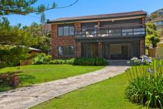 51 North Avoca Pde, North Avoca This quintessential family beach house is situated directly opposite
the surf and sand at North Avoca. Pine View is a comfortable pet
friendly house with filtered ocean views from its living spaces and main
bedrooms. Recently upgraded and freshly painted, Pine View is a relaxed
two storey holiday house which offers open plan spaces, two living
spaces each with a DVD player, two large entertaining decks, stunning
sea breezes and a huge yard for the kids or pets to play. This inviting
holiday house features a timber and beach theme throughout which adds to
its appeal. Enjoy a 10 minute walk along the sand to Avoca Beach where
you can enjoy a coffee or meal and take the kids paddle boating in the
lagoon. Pine View is a five minute drive to Terrigal beach, eateries and
shops and a 15 minute drive to Erina Fair shopping centre. On the upper
level master bedroom contains queen bed, built-in robe, deck access and
ocean views while bedroom 2 contains a double bed. On the lower level
bedroom 3 contains a queen bed, built-in robe and ocean views, bedroom 4
contains two single beds with built-in robes, while bedroom 5 contains a
tri-bunk bed.
Living space contains flat screen TV, DVD player, air conditioner, ceiling fans, views Kitchen contains a dishwasher, electric cook top, microwave, fridge, double sink Ample decks, one with sun lounge and views; other has gas BBQ, table setting for 10 Large fully fenced pet-friendly grassed yard; outdoor shower; close to cafes and shops Wi-Fi internet; ocean breezes; tasteful decor; laundry contains a washer and dryer Stylish bathrooms on both levels; main with combined bathtub/shower and toilet