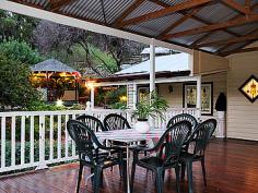 34 Heidelberg Rd Bickley WA 6076.Simply enchanting Honeysuckle Cottage' (circa 1900's)and STUDIO with an
enormous Alfresco DECK which captures the heavenly valley VISTAS,
offered by only a select few properties on a near ACRE on tightly held
and glorious Heidelberg Road.
Laced with beautiful, abundant
LEADLIGHT, gleaming TIMBER floors and high ceilings, romance and charm
encompasses the dear Teddy Bears in residence and I am sure will capture
your heart too.
This desirable, rambling Cottage provides
relatively GENEROUS LIVING areas currently utilizing a Living Room,
Family/TV Room, Study Nook and Formal Dining (or Activity) plus the huge
elevated Alfresco Deck (approx 8.6m x 8m) in addition to the gracious
Verandahs, which provide a fantastic forum for entertaining and family
togetherness with that STUNNING OUTLOOK down the Bickley Valley.
A
delightful free-standing pocket STUDIO (plumbed and powered) with it's
charming bull-nosed verandah is potentially INCOME-PRODUCING and has
current Shire Approval as a Hair and Beauty SALON or I expect a dream
for an Artist or Hobbyist Retreat.
Set on 4031sqm with meandering
paths to the GAZEBO and through the gracious and pretty GARDENS with
delightful pockets and a selection of delectable Fruit Trees. A generous
working BORE supplements SCHEME WATER to the property.
A secondary drive-way provides access to the WORKSHOP, CARPORT and Studio.
Complete with a PONY PADDOCK and a small animal shelter, this may be that last box to tick on your wish list.
What
a DREAM within minutes to Services and highly regarded Schools and
Colleges in Bickley, Carmel and Lesmurdie. Zip through to Welshpool Road
for great access to the Airports and Perth City.
This is SPECIAL
for Cottage and Bickley lovers looking for some extra space and those
gorgeous VISTAS. Please contact Pamela on 0409 581 008 to arrange your
inspection.
Weatherboard and Zincalume Residence (c1900s)
Elevated huge, gabled Patio Alfresco
-- approx 8.6mx8m - built 2010
-- beautiful Valley Vistas
Beautiful Character including
-- Stained Leadlight Glass (most rooms)
-- Timber Floors (also under carpets)
Cottage style Kitchen, dishwasher, pantry
Living Room plus Family/TV Room
Study Nook
Dining Room (Activity or large Study)
Master Bedroom, Ensuite, WIR
Additional 3 Bedrooms, Bathroom, Laundry
Free-standing STUDIO (approx 3mx2m)
-- bull-nosed Verandah
-- powered and plumbed
-- electric HWU (instant)
-- split r/c A/C
-- potentially Income Producing
-- currently approved as a Hair and Beauty Salon