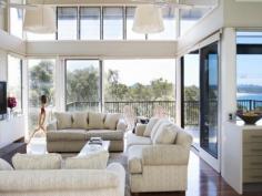 35-37 One Mile Close Boat Harbour NSW 2316
Set on two separate blocks just two hours from Sydney, this exclusive
Boat Harbour hideaway is flanked by National Park. Conceived as a pair
of interconnecting, Eco sensitive pavilions, the house has an elegant
design and exquisite indoor and outdoor living areas, all with a
breathtaking northerly outlook across bush, beach and bay.
Three gorgeous bedrooms, the luxurious master set in its own
pavilion, open plan living and dining with fireplace, family or billiard
room, stunning kitchen with Caesar Stone bench tops and European
appliances, divine bathrooms, "infinite edge" lap pool and cascade,
extensive native gardens, polished timber floors, abundant light and
triple garaging.