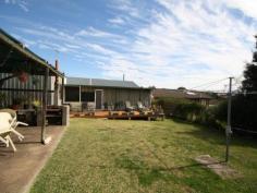 162 Macqueen Street Aberdeen NSW 2336 A Spacious Package This home doesn't look huge from the street but with it's massive QLD room off the back you will find plenty of space. There is a loungeroom at the front of the home with ceiling fan and R/C A/C. A new kitchen with attached dining area plus three bedrooms, the main with a fan and built in robes. The bathroom has been refurbished and there is a separate toilet. The QLD room runs the full length of the home and has roll down blinds for shade. At one end is a portable Spa which the current owners love but are willing to leave at the property for the next person to enjoy. Off the back of the home is a deck area overlooking the fenced yard, there is also a BBQ area. With double off street parking, side access and a single carport and large shed with power this home has the lot. At this price look no further!