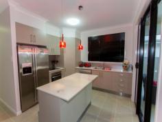 8 Greater Ascot Avenue Shaw Qld 4818 Smart New & Good Tenants - Invest with Confidence This display home is now ready for its new owners and is packed full of extra's not normally included in the price. There are a number of key features to consider including; *brilliant floor plan *main bedroom seperated from other bedrooms and is generous in size *designer private patio - alfresco area *well appointed kitchen with great functionality *large bedrooms all with air conditioning and built ins *rear leading garage - rear lane access to home *limited yard to maintain *hop step and jump to coffee shop The owners will consider all offers as they have decided to sell, inspect with me today.