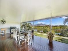 Idalia Your dream home is here!!! This stunning 437 m2 residence has been
designed to enchant with a level of opulence that must be seen to be
believed. Offers the perfect floor plan for families, combined with a
wonderful lifestyle, on the river in Idalia. Offering great views in a
quiet peaceful enviable location!!! This home is a genuine opportunity
like no other to own a statement home, in which meticulous design and on
entering this much loved Balinese residence, has the feeling of
elegance and charm and is immediately apparent. This 2 storey 4
bedrooms, 2 bathroom residence has a very large open plan living area on
the top level opening onto large front deck for large family
gatherings. Gourmet kitchen with large breakfast bar, stone bench tops,
double oven and large walk-in pantry the full length of the kitchen.
Media/family room plus separate granny flat for Mum or teenagers
retreat. Tropical resort style in-ground pool with low maintenance
gardens and on a 804 m2 allotment. 3 car accommodation, large workshop,
plus room to park a boat/caravan inside the property. Out your front
gate and you are on the walkway beside the river. Watch the canoeists
row by or just put a line in to catch dinner.
Great views across the River and over the Golf Course and Mt Stuart. Inspection is an absolute must.
What a lifestyle on offer here!!!