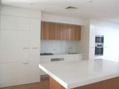 11/16a Frances Street Randwick NSW 2031 This stunning four level home has it all, with large open plan living polished timber floors in living and dining areas, large kitchen with dishwasher,wall oven,gas cook top,in Wall microwave and large island bench top with buffet and storage. you also have bi fold doors that open up and combine the whole level into open open and free flowing space which brings the outdoors in. On the third level you have three good size bedrooms with built in robes in all plus ensuite in main, you also have a study area for added convenience. The Main bathroom provides you with wet room that consists of a shower and large bath tub. On the fourth level you have an entertaining area that will have every body envious of the outlook of the city skyline and it would be just a delight to relax and enjoy and glass of wine or cold beer after hard days work. It does not stop with other features you have of the ducted air conditioning, triple car garage with remote control. internal entry to home, internal laundry, gas connection for BBQ its endless that's why i would put this one first on the inspection list.