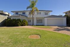 5 Verton Drive Shelley WA 6148 This spacious home has all the room you need for you and your family,
whilst providing you with the opportunity to add value in this near
river residence.
As you enter this impressive home, French doors lead you to a large
Lounge and separate Dining area. Continue through to an expansive living
area, including Kitchen, meals & family plus a separate games room
all with neutral décor. On the ground level, you will find 3 double
bedrooms each with double built in robes , a well-appointed semi en-suite bathroom and large laundry with ample storage.
The second level is designed for the adults to enjoy, with a sitting
room and study both opening on to a balcony with stunning river views.
The main bedroom is also on this level, with a stylish en-suite with spa
plus a separate powder room and walk in robe.
As you walk outside to the extensive paved patio
area, you will be impressed with the large, level back yard that offers
plenty of space for the kids to play, and could easily fit a large pool
and workshop, if desired.