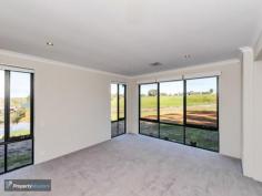 45 Alawoona Circle Bullsbrook WA 6084 This well appointed home will impress all along with the spectacular valley views to the south of this well positioned quality 4 x 2 home. Take a drive out see for yourself. You must put this one on your list if you are thinking of living out here. At this price, the home won't last. HOME OPEN BY APPOINTMENT. Some of the features of the home are: - Good size master bedroom with large ensuite complete with italian tiles, double shower, large bath and twin vanities - BIR's and carpet in all bedrooms - Separate home theatre - Activity room near bedrooms - Appealing tiles throughout which flow onto the Alfresco - Huge kitchen with island complete with good size island - Stainless steel gas stove top and electric oven - Home just completely repainted inside - just move in! - Large entrance hall with feature wall - Ducted reverse cycle air conditioning - Double carport with remote control roller door - Reticulation - Solar hot water system - Free 12 mt x 9 mt shed (not assembled) - 20 ft sea container (optional) - Biosystem 2000 septic - 150,000 litre water tank