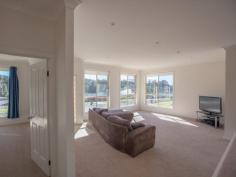 Bermagui NSW 2546 A high quality 3 bedroom ensuite home with great street appeal, plus additional boat/caravan garaging. A sunny and spacious open plan design features a split level living space at one end, that adds interest and variety to the design. At the other end sits the kitchen with stainless steel oven and ceramic cooktop, and access to a paved rear patio. The living space and front verandah enjoys northerly views over the surrounding area with ocean glimpses in the distance. As well as a double garage with internal access to the house, there is a detached metal garage with extra high clearance especially for boats or caravans.