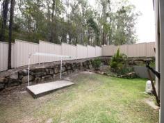 21 Caragh Crescent Oxenford Qld 4210 * Sitting on the 600 m2 block and positioned on an elevated block amongst a bushland * This double story home is suitable for family * Features include: Lower level Spacious kitchen with dishwasher Separate living/dining tiled areas extend out onto undercover patio Sturdy room Internal Laundry Powder room Upstairs 4 large bedrooms Master bedroom with en-suite