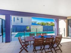 6 Narrabeen St Kingscliff NSW 2487 DESIGNED FOR AN ENTERTAINMENT A rare offering for sale is this two storey "Sanctuary 28" built home designed for alfresco lifestyle. Located in the prestigious Salt north beachside precinct only moments' walk to the pristine Salt Village beach & the Salt Village Café and retail strip. The floor plan will appeal to a family who is seeking living space options. Two internal living areas, two outdoor entertainment areas and a truly unique pergola covered outdoor Master retreat with north easterly aspect. All of this overlooking a 12 metre saltwater solar heated pool & spa! The master bedroom is a major highlight with huge walk in robes & stunning ensuite with a cracker spa bath! The kitchen is first class! Designed with expansive stone bench tops, European appliances & an abundance of cupboard storage space to house all of those speciality appliances. The sleeping quarters on the lower ground floor level comprise 3 generous sized bedrooms, two with pool views. The bathroom is very generously proportioned & boasts Grohe tapware. The 695m2 allotment has been planned out by `green fingers` to offer the new owners a magnificent combination of native plantations offering very low maintenance. The bonus for the outdoor enthusiast is the side access for the boat, jetski or campervan. Homes of this calibre in Salt Village are rare.