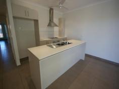 3/10 Scott Court FARRAR NT 0830 This fully air conditioned 3 bedroom unit features ceramic tiled flooring throughout with the open plan living and dining area offering views onto the tiled rear verandah and landscaped private rear yard. A well completed galley style kitchen is completed with stone benchtops, electric appliances including a dishwasher, generous storage space and the fridge alcove has a water tap for a plumbed in fridge. The master bedroom is of a good size and offers a built in robe with sliding mirrored doors and louvre windows with security bars allowing full ventilation. The ensuite off the master bedroom is completed with a double shower and a stone benchtop to the vanity. The 2nd and 3rd bedrooms offer built-in robes with sliding mirror doors and louvre windows with security bars, within the passage is alcove fitted out with storage cupboards and benchtop. The laundry is located in the hallway neatly concealed behind concertina doors, the main bathroom is spacious and offers separate shower and bath. Located within the roofline of the rear verandah is a storeroom, the rear yard has a boundary garden and lawn which is irrigated. The property is fully fenced, there is a side pedestrian gate and a clothesline is fitted to the side wall, there is undercover parking for 2 vehicles and the front of the unit. The small complex is well presented and maintained, it is a short walk to a local residential park and a short drive to Palmerston CBD.
