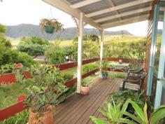 KYOGLE, NSW 2474 This exquisite home is located in the beautiful country village of Wiangaree. Only 50 minutes N/East of Lismore and under 1.5 hours to Brisbane, Gold Coast and Byron Bay. Feature include: - 3 Large Bedrooms all with built-ins and ceiling fans - Open plan kitchen, living and dining - High raked ceilings - Reversed cycle air conditioning - Fully insulated - Cladded with Hardiflex - a tough, hard wearing, low maintenance product - Immaculate gardens - 1 bay shed with workshop, storage room on concrete floor - Undercover BBQ area - Separate car port - Fully fenced with colour bond fencing - North easterly facing verandas with magnificent views of surrounding mountains - 10,000 gallon rain water tanks - Rubbish collection out front - Very well maintained property