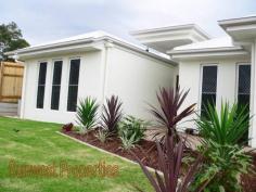 9 Dunnart Street Victoria Point Qld 4165 Brand New & Ready For You 4 Bedroom Home + Ensuite + Double garage Every home this builder produces is a touch of class. It comprises of 4 good sized bedrooms, with an ensuite and W/I robe to the master. All bedrooms have large built-in robes. There are three comfortable living areas made up by a carpeted formal lounge (with cutout feature walls), a huge tiled family/dining room, which in turn opens out to the under-roof alfresco living room. Adjoining the family room is a state of the art kitchen, with noting but the best quality in its appliances. The home has a double lockup garage with remote access. The front garden is pleasantly landscaped and gives the home a nice street presence – & comes with a matching letter box. The back garden is fully fenced with access gates on both sides. As with every home this builder produces the, sometimes small, attention to detail is what sets his homes aside from others in the same price range. Details such as the many intricate changes of roofline, the larger than life front door, higher ceilings, the number of power points - just to mention a few. Situated in the ‘Eprapah Estate’ just a few minutes away from the main Victoria Point shopping centre, schools, cinema, cafes, and so much more. Victoria Point is a truly beautiful bayside suburb, and is a must for boaties and fisherman alike. CLICK ON ANY PICTURE TO ENLARGE – 18 pictures in total A copy of the “Sustainability Declaration Statement” for this property can be viewed on request, or by dropping into our office. Please call (07) 5546 9093 for our office hours. Property Information Area: 500 Square Meters Bedrooms: 4 Bathrooms: 2 Garage Spaces: 2