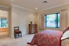 10 Elizabeth Avenue Mundaring WA 6073 If you are searching for a top quality property that offers a serene, tranquil and very private rural lifestyle and yet still in arms reach of all conveniences, then you must put “Lakeview” at the very top of your wish list. 4/5 bedrooms 3 bathrooms Formal & informal living Excellent patio/alfresco Large lake and winter creek 3 phz 120sqm pwd shed Large brick triple garage 2 fully fenced paddocks 45 minutes to Perth CBD 3.53 Ha (approx 8.75 acs) Peaceful, private & perfect When you first approach this wonderful property you are struck by a sense a real peace, tranquillity and the excitement of wanting to know more. The residence itself is very generously proportioned and oozes class and style. Boasting 4 king sized bedrooms, a prestigious master ensuite and two other bathrooms. A fifth bedroom is available although it is currently used as a second office. Formal and informal living areas are provided with informal living exiting out to the large patio/alfresco entertaining area. Magnificent lake and valley views are there to feast upon while enjoying the magical ambience on offer. Other features that will delight include soaring high ceilings, wide passage hallway, a well appointed timber kitchen with huge walk in pantry, stunning timber floors and reverse cycle air conditioning. A mini chip and putt golf course has been created over the land for golf enthusiasts to practice and a real golf course is just at the end of the street. Two fully fenced paddocks (ideal for the pony), large fenced vege patch, and a three phased 120sqm powered work shed are also other features to impress. Three car garaging is provided to top of this special property. Located on an undulating 3.53Ha (approximately 8.75 acres) with mains water supplied and lake reticulation to the land, this property is just 45 minutes to Perth city, 20 to 25 minutes to airports and only a healthy stroll to Mundaring village; why would you want to live anywhere else?