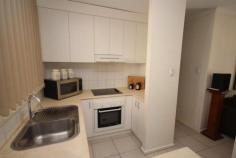 42/111 Bloomfield Street Gillen NT 0870 MODERN AND CUTE TWO BEDROOM UNIT ! Immaculate two bedroom ground level unfurnished unit with beautiful courtyard and security screens t/out. Main bedroom with carpet, blinds, built in robes, fan and reverse split air conditioning. Rear 2nd bedroom also with fan, carpet, blinds and built in robes. Fully renovated bathroom with floor to ceiling tiles, shower only and new vanity. Open plan & spacious tiled living/dining area with fan, blinds, split reverse air conditioning with access to rear courtyard through glass sliding doors. Modern kitchen with electric cooking, ample cupboard & bench top space. Internal laundry also with cupboard space and leading to rear courtyard. Separate storeroom and garden shed for storage. Welcoming veranda and fully fenced courtyard for outdoor entertaining. Single car parking at front of unit, communal pool in complex. Sorry, no pets.