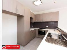 21/37 Orenco Bend Clarkson WA 6030 Conveniently located within 100m of the Clarkson train station and situated on the first floor, this light bright and modern 2 bedroom 2 bathroom apartment offers a high class level of living on a budget designed for the money conscious. Situated in a secure and low maintenance complex, this wonderful apartment features a tiled entrance that leads into a spacious open plan living and meals area, which opens up further via a sliding patio door that t leads out to a large tiled balcony, which is just perfect for relaxing on, during one of Perth's beautiful summer evenings. The modern and well appointed kitchen features both below bench and overhead cupboards, a microwave and refrigerator recess, plenty of bench space and also comes complete with stainless steel appliances including and under bench electric oven, range hood, electric cook top and dishwasher. The ‘New York’ style laundry off the hallway includes a wall mounted clothes drier, laundry trough and space for a washing machine, and to the opposite side of the hallway you will find a large linen press and the one of the modern bathrooms, which features a full sized bathtub, separate shower and vanity. At the end of the hallway you will find the spacious Master Bedroom, including matching 'his and hers' built in mirrored door wardrobes, and a private modern ensuite, along with the second bedroom, which is double in size and also features a built in mirrored wardrobe. The apartment is kept at the perfect temperature all year round via the large split system air conditioning unit and also comes complete with a large lockable storage room that is located opposite the front door of the apartment, plus it also has a secure parking bay. All this will enable you to live the lifestyle you crave without the stresses of budgetary restraints!