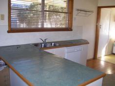 21 CORCORAN ST, Berrigan AREA: 2017.0m2
LOCATION: 21 Corcoran St Berrigan, is close to schools and all town amenities, rear lane access into second enclosed back yard
This comfortable family home is well located. An easy walk to town.
With its 9 ft. ceilings, polished timber floors in the living areas,
carpeted hallway and bedrooms and quality blinds and curtains
throughout, it is waiting for you to include your personal touch to it.
Some of the many features include:
* KITCHEN: Walk-in pantry, dish washer, electric stove with range hood, breakfast bar, lots of cupboards.
* BATHROOM: Bath, glass shower, vanity, tiled floor. SEPARATE TOILET.
* THREE LARGE BEDROOMS: All with spacious wardrobes and decorative practical timber shelving
* LAUNDRY: Good sized with linen cupboard and tub.
* LARGE LINEN CUPBOARD in carpeted hallway, adjacent to bedrooms and bathroom
MASSIVE GRASSED AND EASY CARE BACK YARD, safely fenced for children and pets.
A 6 m x 12 m SHED WITH CONCRETE FLOOR, CUPBOARD SPACE AND SHELVING - AND POWER. GARDEN SHEDS
Another fully fenced graveled yard area accessible from rear laneway, divided from back yard by secure fencing.
A QUALITY HOME IN QUIET STREET
ASKING $172,000.00 NEG