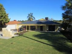 49 Adelaide Circle Craigie WA 6025. ATTENTION FIRST HOME BUYERS / INVESTORS FIRST HOME OPEN SATURDAY 9 AUGUST 12.45PM-1.30PM SECOND HOME OPEN SUNDAY 10 AUGUST 12.45PM-1.30PM Situated
on a 750m2 block in this most sought after suburb this very well
presented home is not to be missed. Built in 1986 to a high standard
this property is ideally located. With only minutes to the Freeway,
minutes to major shopping, minutes to a train station, minutes to
schools, minutes to a recreation park and minutes to the beach, what
more do you want. As you enter, a long corridor greets you which
gives you the feel of space. There is a sizeable separate lounge area
followed by a very functional kitchen and a separate dining/family area.
The main bedroom is a good size and the bathroom has been tastefully
renovated. Ducted air conditioning and ceiling fans add to the comforts
this home offers. The outside areas have been carefully planned with the
opportunity to add your own undercover entertaining areas. DO NOT MISS
THE OPPORTUNITY !! Boasts: * 3 Bedrooms * 2 Living Areas * 1 Bathrooms * Functional Kitchen * Ducted Air-Cond * Ceiling Fans Rates--Water $ 869.00pa - Council $1,394.00pa
View Sold Properties for this Location View Auction Results
General Features Property Type: House Bedrooms: 3 Bathrooms: 1 Land Size: 750 m² (approx) Indoor Features Air Conditioning
Outdoor Features Carport Spaces: 2 Other Features Dining, Entrance Hall, Gas Connected, Kitchen, Lounge, 1 Storey, Verandah, Water Closets