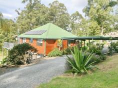 216 Freemans Road, Lower Beechmont, Qld 4211 COASTAL VIEWS FROM QUIET ACREAGE This cedar clad home is located in sought after Freemans road and boasts magnificent views north-east to the coast and Runaway Bay. There is very little traffic in this quiet no- through road so you will be able to enjoy the peace and tranquillity from the elevated timber deck whilst taking in those views. The home is just 12 years old and has three bedrooms and two bathrooms upstairs whilst downstairs offers another living area and adjoining bedroom plus bathroom, ideal for guest accommodation or teenager's retreat. A good sized steel shed offers parking for two vehicles plus storage . 3.2 KW of solar cells with a 5KW inverter have virtually cancelled electricity bills and of course with rainwater there are no water rates. This attractive property is just 15 minutes to Nerang yet miles from the hustle and bustle. Why not take a drive up the mountain and see for yourself ! General Features Property Type:House Bedrooms:4 Bathrooms:3 Land Size:0.55ha (1.36 acres) (approx) Price per acre:$403,676 Indoor Features Ensuite:1 Living Areas:2 Toilets:2 Floorboards Broadband Internet Available Built-in Wardrobes Dishwasher Outdoor Features Carport Spaces:2 Garage Spaces:2 Open Car Spaces:6 Deck Outdoor Entertaining Area Shed Outside Spa Eco Friendly Features Solar Panels Water Tank Greywater System