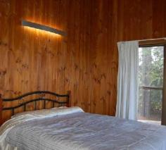 Witta, QLD, 4552 This one acre property (3917 sqm) is ideally situated, enjoying good elevation and a lovely outlook across Witta, as well as a high degree of privacy. The two bedroom timber house has loads of character with timber VJ internal walls and ceilings and polished hardwood floors. With 2 bedrooms and a single bathroom the home is suitable for a small family, couple or a weekender for the lifestyle buyer. With a full length verandah on two sides of the home, comprising new decking and balustrade, the outdoor living area takes in the view and offers a lovely aspect over the land. The kitchen and bathroom are original to the home and have been left that way for the new owner to change according to taste. With features such as high ceilings, exposed timbers, fireplace, verandah and a rolling hills outlook buyers will not be disappointed. The property is accessed by an all weather driveway which leads down to the garage, offering additional space for storage and workshop. Rainwater storage is 8000 gallons split between two galvanized tanks.