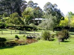  71 Picketts Valley Road Picketts Valley NSW 2251 IDYLLIC ACRES Be one of the privileged few who can live idyllically on 2.5 acres, yet be only a 5 min drive to Avoca Beach. Immerse yourself in the magnificent gardens, where privacy reigns supreme, or relax by the pool, protected by manicured hedges. When all else fails, contemplation by the brook will soothe the soul. The home is meticulously presented, offering formal and informal areas, wrap around verandahs, large entertaining deck overlooking the pool and manicured lawns and pony paddock to complete the picture. It also has a fantastic rumpus room spilling out onto paved undercover outdoor area and triple garaging with internal access. Your viewing of this outstanding property is highly recommended. General Features Property Type: Acreage/Semi-Rural Bedrooms: 5 Bathrooms: 3 Land Size: 1.00ha (2.47 acres) (approx) Indoor Features Ensuite: 1 Alarm System Study Dishwasher Rumpus Room Outdoor Features Garage Spaces: 3 Other Features Dining Room, Ducted Air Con, Family Room, Lounge Room, Storage, Verandah. 