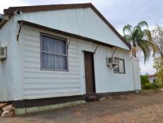 64 Simpson Street Mount Isa Qld 4825 Walking distance to the CBD, this property is perfect for the small business. Situated at the rear of the property is a large workshop with bathroom and toilet and is suitable for day to day business Redevelopment opportunity 1012m2 block close to schools Ideal for units 2 separate sheds, 3 phase power 2 bedroom dwelling on the property Features Air conditioning