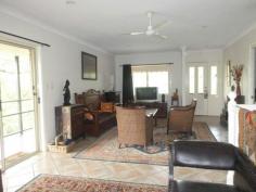Murwillumbah, NSW, 2484 Room to move on this 1 1/4 acre rural living block with town water at Dallis Park backing onto farmland with lots of privacy. A stylish & elegant family home of 4 bedrooms, 3 bathrooms, large open plan living opens out to the verandah taking in the fabulous rural views. A great potential to configure the downstairs living area to a granny flat for the extended family or guests and meandering pathways flow through the beautiful rainforest gardens.