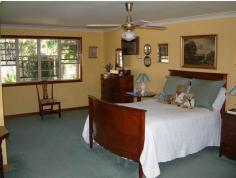 This
large contemporary Colonial home has the warmth of western cedar
cladding to the exterior walls & mist green colourbond to the roof.
Wide verandahs run along two sides and the front of the home. The
timber scrolls on the verandah posts complement the lattice and
handrails which enclose the verandahs giving that colonial appeal.
The driveway leads to a double lock-up colourbond shed which
accommodates the family vehicles. There is also another colourbond shed
at the rear of the garden for lawnmowers, garden tools, and Dad’s toys.
Internally the home features:
An Upstairs Main Bedroom suite has air conditioning, a full wall of
built-in wardrobes, an ensuite with a claw foot bath, double basins and
parents retreat.
The double entrance hall has twin built in’s and its own ensuite which
assists in servicing the large living areas and study. There are three
other bedrooms two have ceiling fans & built-ins the other built-in
shelves.
The main bathroom services the downstairs bedrooms
There is a formal lounge with its own open fireplace.
The combined kitchen/meals area is across from the formal Dining Room.
A combined wet area of separate toilet ,main bathroom& laundry with
walk through access.
.
Two off the three bedrooms have French door access to the verandahs.
The main living area is . also fitted with reverse cycle air
conditioning
This very spacious home is set on a 7300 m2 tree studded block included
in this listing is a house plan, also room dimensions which will assist
your decision to inspect.
Barellan point is a sought after acreage area just 10 minutes to
Ipswich, 30minutes to Brisbane and the area has its own shopping centre
and Tavern.
Features
Lockup Garage Close to Day Care Centre Close to Local Shops Close to Primary School Close to Parks Heating Verandah/Deck Air Conditioning Ceiling Fans Ensuite