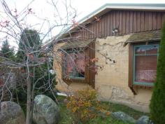 158 Scenic Dr Adaminaby NSW 2629 $395,000 Approx 2.23 Ha (5.5 Acres) Take
this opportunity to secure this large 6 bedroom home on over 5 acres of
land. Set in the Snowy Mountain Village of Adaminaby this property is
set to take in the northern sun and overlooks the township. All
amenities are to the home and is currently used as holiday
accommodation. Constructed of a mud brick type block and rendered this
really is an unusual and unique home. The home would provide room and
comfort for guests or extended family as there are wood heating, gas
heating, two kitchens, three bathrooms and 6 bedrooms. A fenced house
yard will also keep the kids at bay. A 4 Bay carport complete the home.