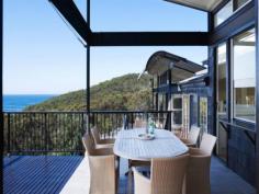 35-37 One Mile Close Boat Harbour NSW 2316
Set on two separate blocks just two hours from Sydney, this exclusive
Boat Harbour hideaway is flanked by National Park. Conceived as a pair
of interconnecting, Eco sensitive pavilions, the house has an elegant
design and exquisite indoor and outdoor living areas, all with a
breathtaking northerly outlook across bush, beach and bay.
Three gorgeous bedrooms, the luxurious master set in its own
pavilion, open plan living and dining with fireplace, family or billiard
room, stunning kitchen with Caesar Stone bench tops and European
appliances, divine bathrooms, "infinite edge" lap pool and cascade,
extensive native gardens, polished timber floors, abundant light and
triple garaging.